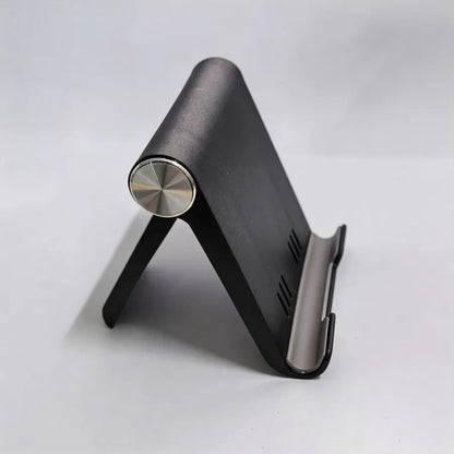 Soporte ajustable para teléfono, portátil y plegable.