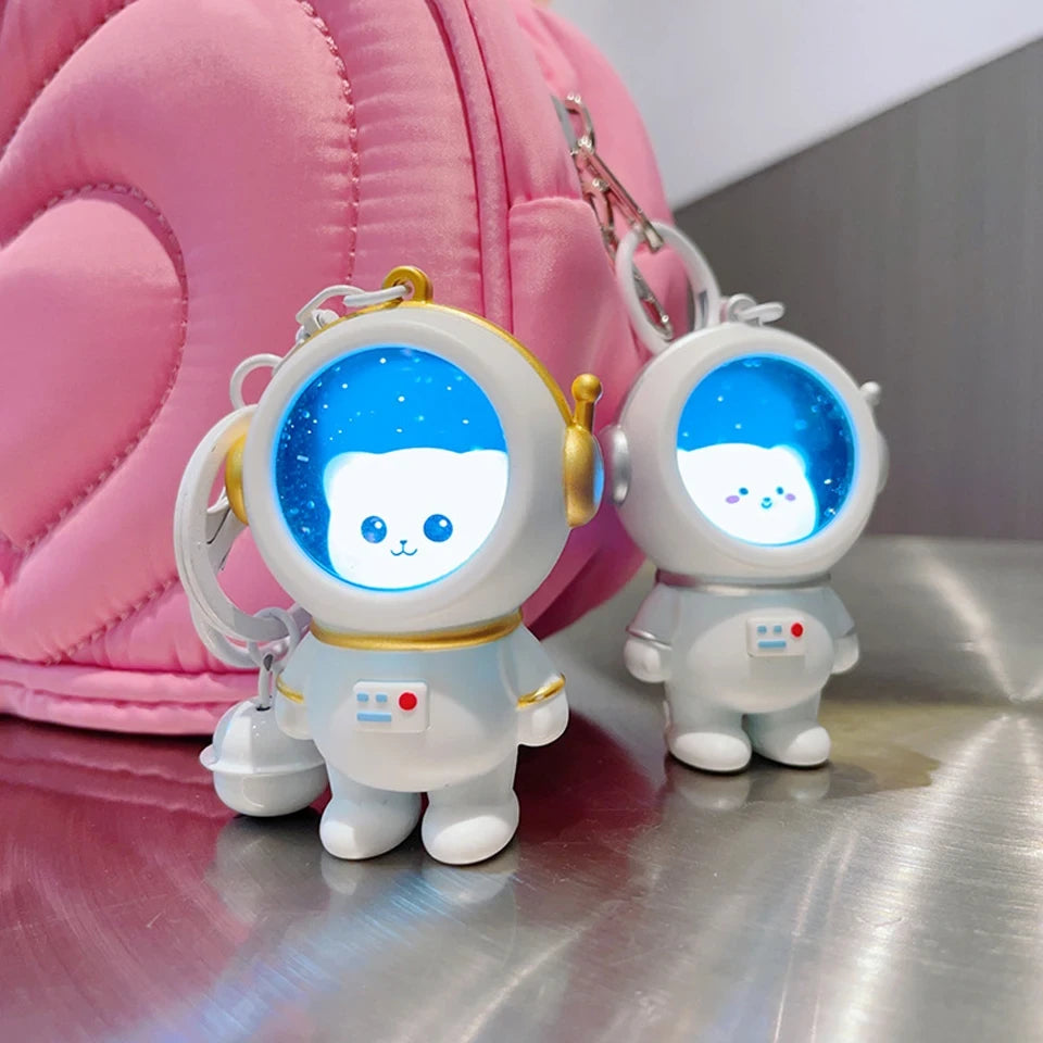 Llaveros para mochilas escolares con forma de gato astronauta, luz nocturna brillante de ZAKOL.