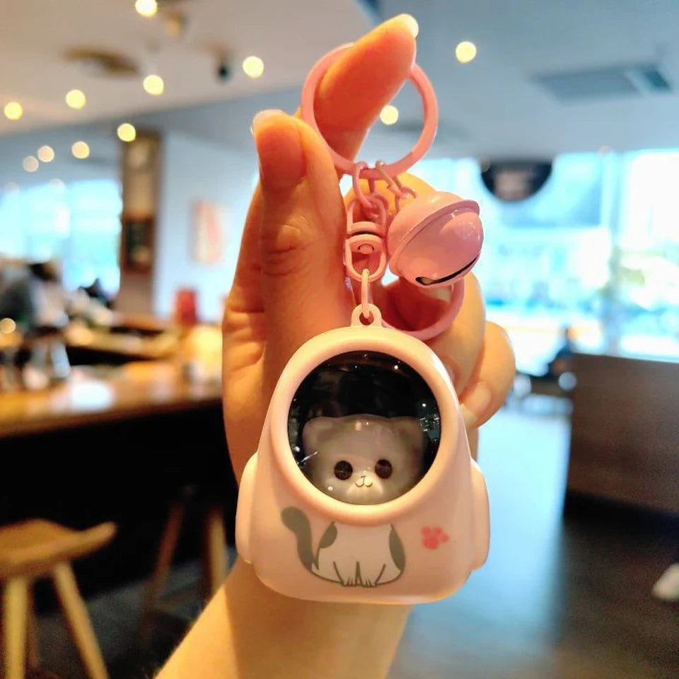 Llaveros para mochilas escolares con forma de gato astronauta, luz nocturna brillante de ZAKOL.